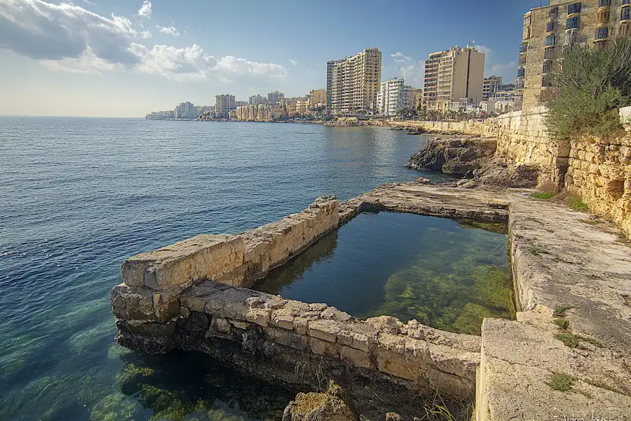 victorian era baths along sliemas rocky coastline